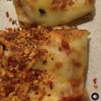 Beggars Pizza - two slices of pizza on a plate - Pizza Near Me - Harvey, Illinois Beggars Pizza - two slices of pizza on a plate - Pizza Near Me - Harvey, Illinois