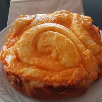 Bolo Cakery - a piece of cheese on a plate - Bakeries Near Me - Calgary, Alberta Bolo Cakery - a piece of cheese on a plate - Bakeries Near Me - Calgary, Alberta