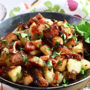 Funny Mugs Bistro - Home fries with onions and parsley. This dish is prepared every day from scratch. - Breakfast & Brunch Near Me - Port Richey, Florida Funny Mugs Bistro - Home fries with onions and parsley. This dish is prepared every day from scratch. - Breakfast & Brunch Near Me - Port Richey, Florida