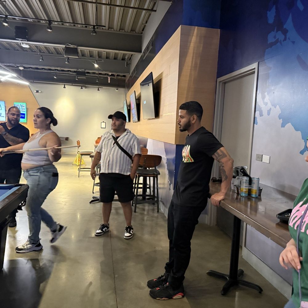 Topgolf - Playing pool - Golf Near Me - Holtsville, New York Topgolf - Playing pool - Golf Near Me - Holtsville, New York