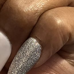 They cut the front of my cuticle which still hurts. They cut the front of my cuticle which still hurts.