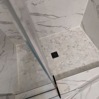 Century City Baths & Remodels - Shower ledge pitched outwards instead of towards the drain - General Contractors Near Me - Bensenville, Illinois Century City Baths & Remodels - Shower ledge pitched outwards instead of towards the drain - General Contractors Near Me - Bensenville, Illinois