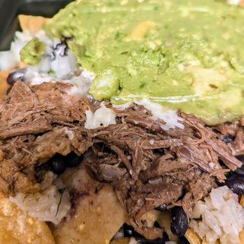 Cabo Bob's Burritos - Close up of brisket nachos - Mexican Near Me - Austin, Texas Cabo Bob's Burritos - Close up of brisket nachos - Mexican Near Me - Austin, Texas