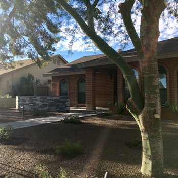 Envirogreen Landscape Design - Build - Behind the palo verde by the front windows are custom metal planters with succulents. We get more compliments about them than anything else. - Landscape Architects or Designers Near Me - Scottsdale, Arizona