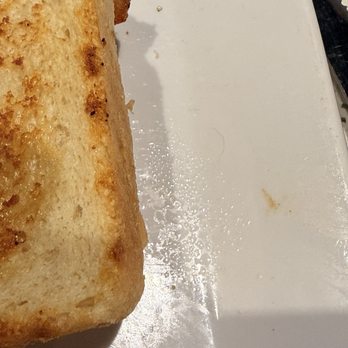 Sidelines Grille - This is the photograph of the little eyelash or tiny hair beside my sandwich - American Near Me - Holly Springs, Georgia