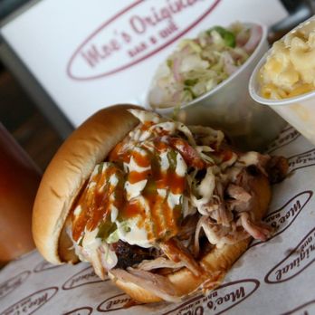 Moe's Original BBQ - a pulled pork sandwich and coleslaw - Barbeque Near Me - Destin, Florida Moe's Original BBQ - a pulled pork sandwich and coleslaw - Barbeque Near Me - Destin, Florida