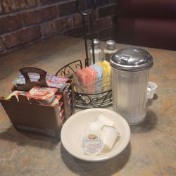 MOE'S Restaurant - Actual half and half ... no creamer here  Along with assorted jellies