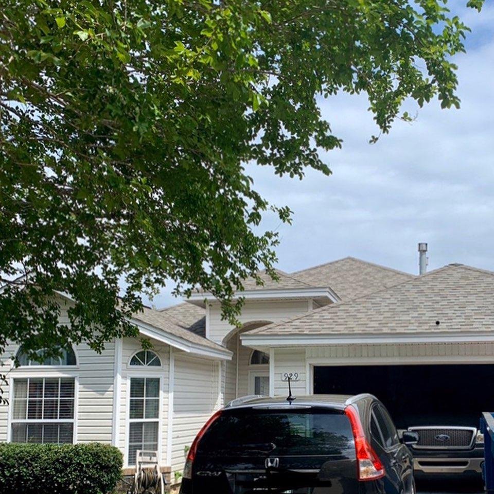 Slide of Timberman Roofing