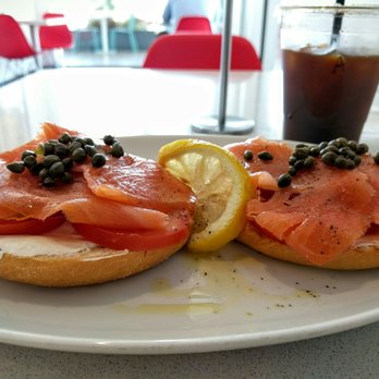 Aroma di Roma Centro - Smoked Salmon bagel $10. Toasted bagel, cream cheese, red onion, tomato, smoked salmon, capers, salt/pepper, olive oil and a lemon garnish. - Coffee & Tea Near Me - Long Beach, California