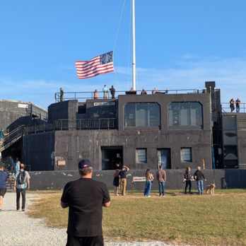 Fort Sumter Tours - Fort Sumter lowering the flag - Tours Near Me - Charleston, South Carolina Fort Sumter Tours - Fort Sumter lowering the flag - Tours Near Me - Charleston, South Carolina