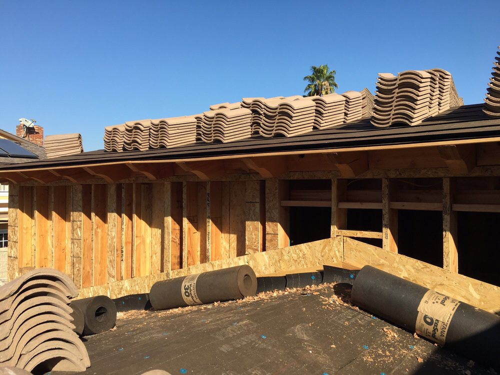 Slide of Mario's Roofing Services