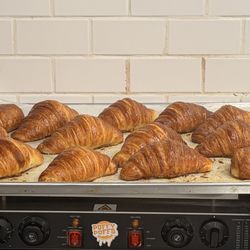 Fresh baked croissants available on the weekends