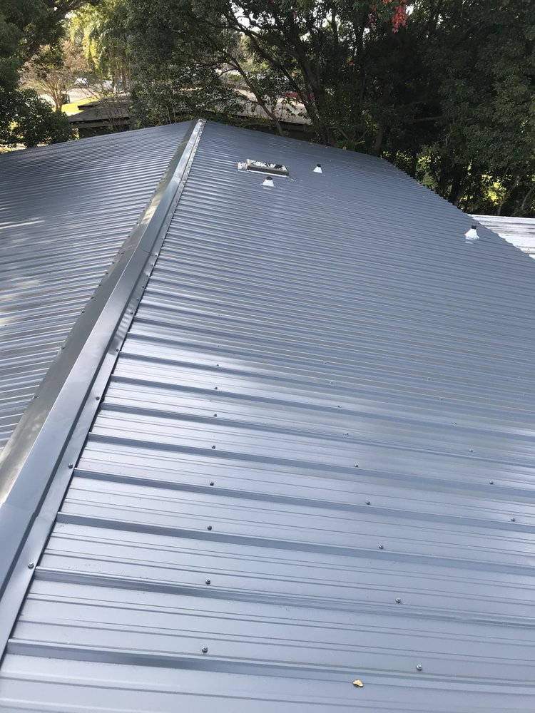 Slide of Menzel Roofing Services