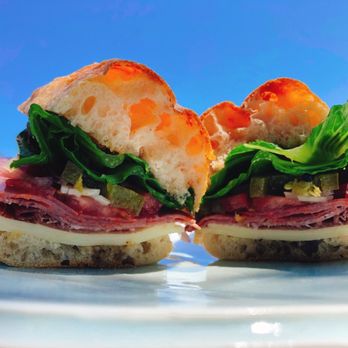 Cosmos To Go - two sandwiches on a plate - Desserts Near Me - Provincetown, Massachusetts Cosmos To Go - two sandwiches on a plate - Desserts Near Me - Provincetown, Massachusetts