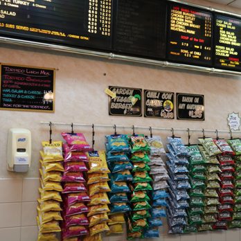 Jersey Subs - a wall of chips and a menu - Delis Near Me - New Brunswick, New Jersey