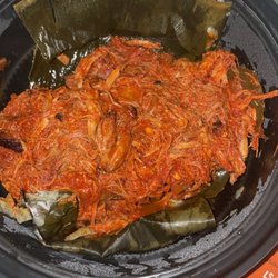 Barrio Taco - A tamale . The pork is on top of the green corn bread dough ( weird)