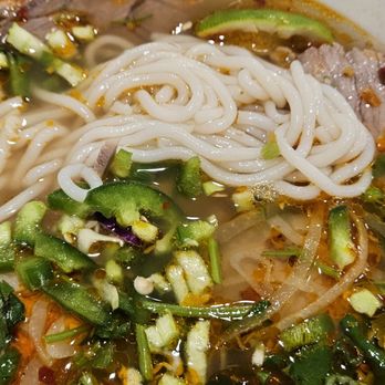 Pho Viet Cali - Bún Bò Huế showing thicker rice noodles - Vietnamese Near Me - Reseda, California Pho Viet Cali - Bún Bò Huế showing thicker rice noodles - Vietnamese Near Me - Reseda, California