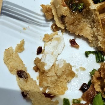 Eggsquisite Cafe - Paper cooked into my Chicken and Waffles. - Breakfast & Brunch Near Me - Mansfield, Texas