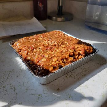 Soul Essentials, A Bakery - a baking dish on a counter - Food Delivery Services Near Me Soul Essentials, A Bakery - a baking dish on a counter - Food Delivery Services Near Me