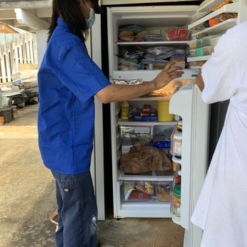 Ace Appliance Service - Justin diagnosing outside refrigerator problem - Appliances & Repair Near Me Ace Appliance Service - Justin diagnosing outside refrigerator problem - Appliances & Repair Near Me