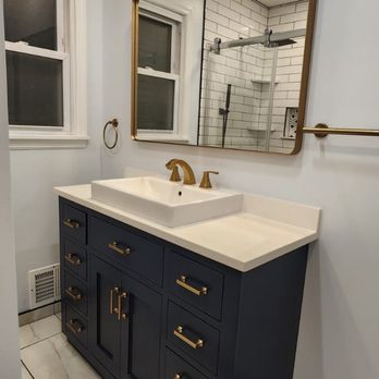Spray Painting - Second step in painting, painted and installed cabinet in the bathroom - Painters Near Me Spray Painting - Second step in painting, painted and installed cabinet in the bathroom - Painters Near Me