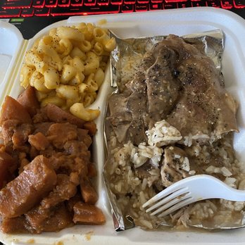 Messi Soul Kitchen - Smothered pork chops, Mac and cheese, and candied yams (sweet potato) - Soul Food Near Me - Riverside, California Messi Soul Kitchen - Smothered pork chops, Mac and cheese, and candied yams (sweet potato) - Soul Food Near Me - Riverside, California