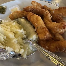Creston Family Restaurant - Beer-batter chicken strip and baked potato.