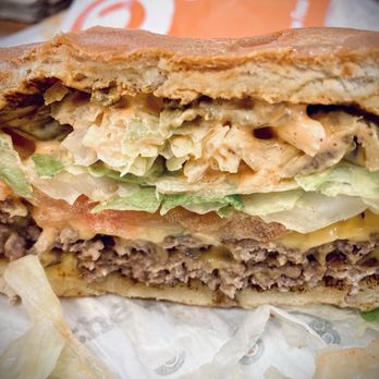 A&W Restaurant - (Single) Spicy Papa Burger (cross section) - Burgers Near Me - Sparks, Nevada A&W Restaurant - (Single) Spicy Papa Burger (cross section) - Burgers Near Me - Sparks, Nevada