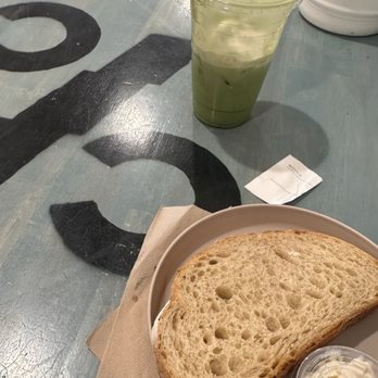 Communitea Coffee - Matcha & Sourdough Bread Slice with butter - Coffee & Tea Near Me - Brea, California Communitea Coffee - Matcha & Sourdough Bread Slice with butter - Coffee & Tea Near Me - Brea, California