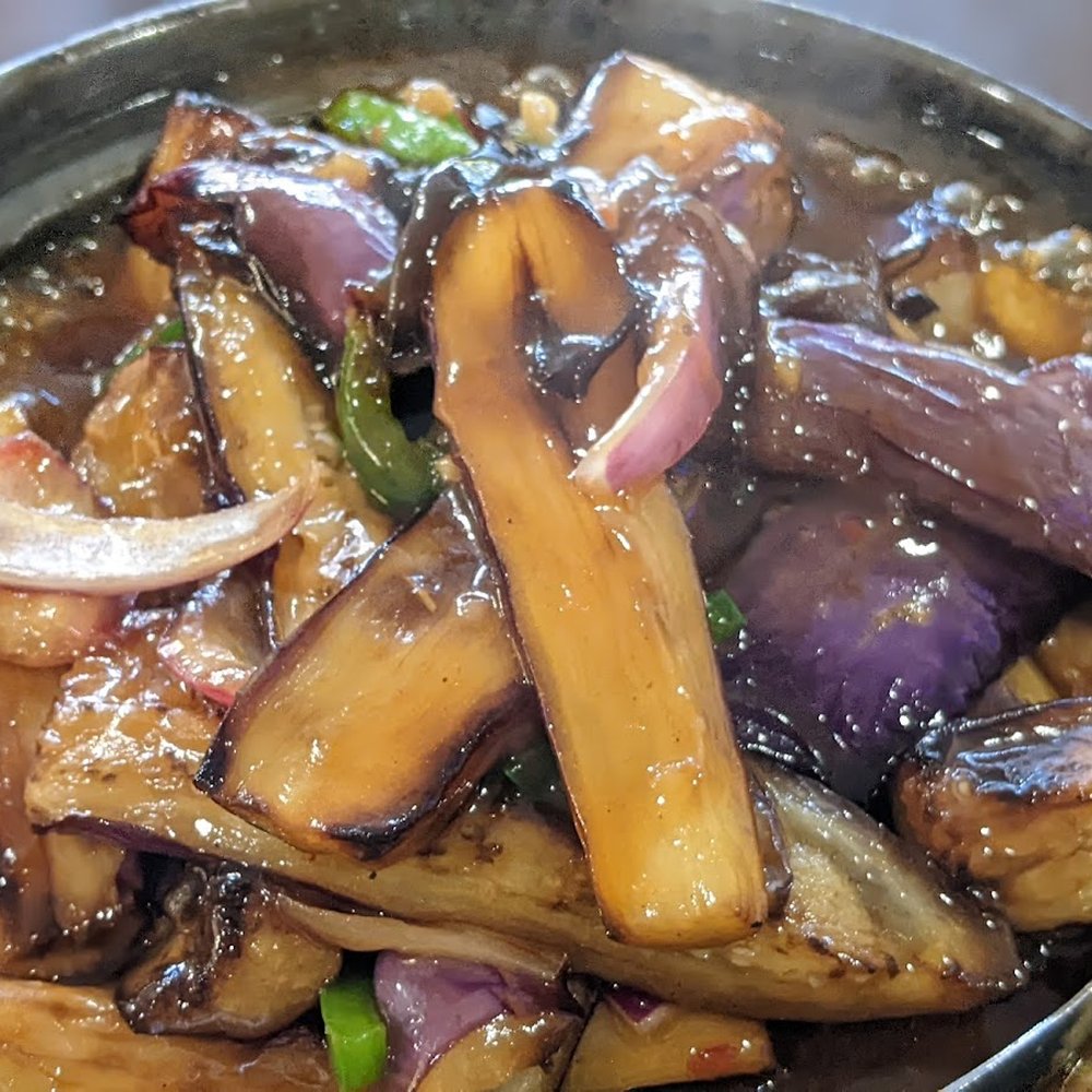 Asia Village - Spicy Eggplant in Garlic Sauce in Sizzling Hot Pot - Chinese Near Me - Sunnyvale, California Asia Village - Spicy Eggplant in Garlic Sauce in Sizzling Hot Pot - Chinese Near Me - Sunnyvale, California