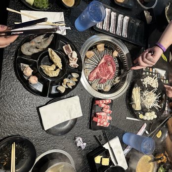 Top Pot KBBQ- Cincinnati - Full table of food. - Korean Near Me - Sharonville, Ohio