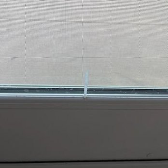 Newman Windows & Doors - Caulking dripped onto new window and stained - Windows Installation Near Me - Carlsbad, California Newman Windows & Doors - Caulking dripped onto new window and stained - Windows Installation Near Me - Carlsbad, California