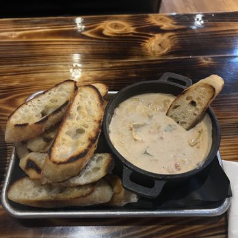 John Henry's Grill - Tomato, spinach & artichoke dip. - Steakhouses Near Me - Rome, Georgia