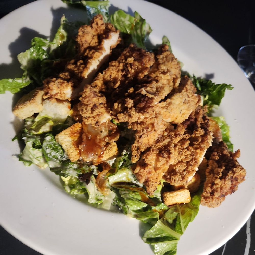 LUMORA - Cajun chicken fried chicken over mashed potatoes - New American Near Me - Covington, Louisiana