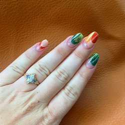 Ann’s Nails & Spa - First photo is of my hands, the set that the miraculous Lin reproduced.