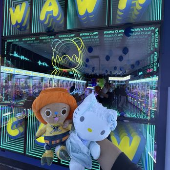 Wawa Claw - Love this neon lit mirror wall to show off today's pulls - Arcades Near Me - San Diego, California