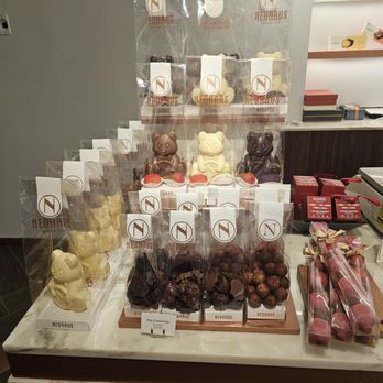 Neuhaus Belgian Chocolate - a display of chocolates - Chocolatiers & Shops Near Me - New York, New York Neuhaus Belgian Chocolate - a display of chocolates - Chocolatiers & Shops Near Me - New York, New York