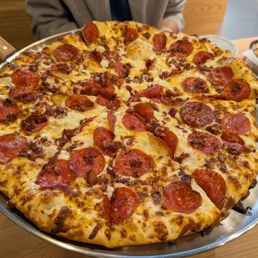 Large Pepperoni with Bacon and Their garlic white sauce. Large Pepperoni with Bacon and Their garlic white sauce.