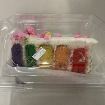 Calico Cake Shop - Slice of rainbow cake $5. Low quality icing - Bakeries Near Me - Buena Park, California