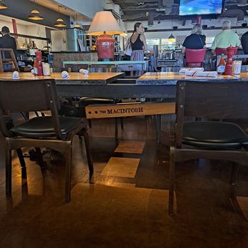 The Macintosh - Cool little detail--their name stamped under the table - New American Near Me - Phoenix, Arizona