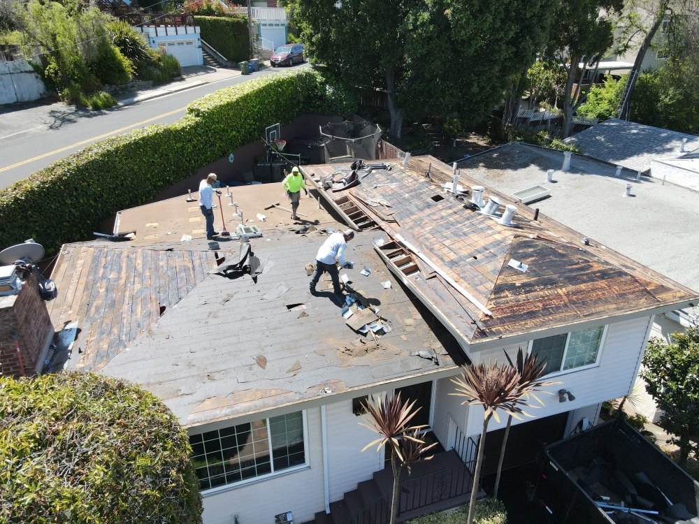 Slide of Trio Roofers