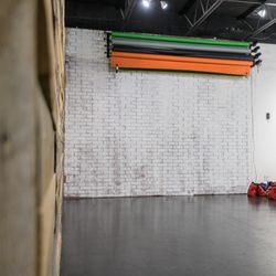 Orlando Photography Studio - Our motorized 4-roll paper backdrop system and white-washed wall make for great options for any session.