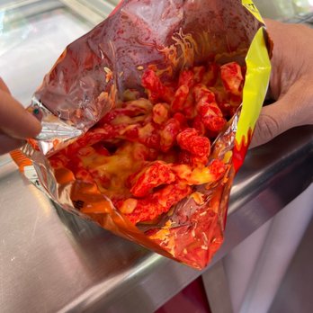La Michocana Express - a person holding a bag of food - Ice Cream & Frozen Yogurt Near Me - Santa Ana, California