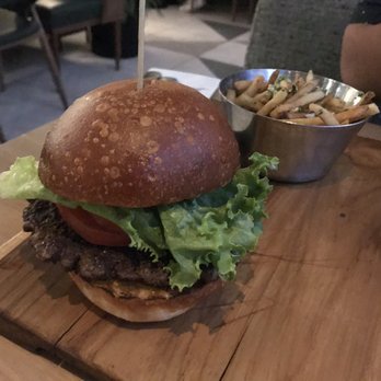 Earls Kitchen + Bar - Burger with garlic fries (+$2) - Canadian (New) Near Me - Burnaby, British Columbia