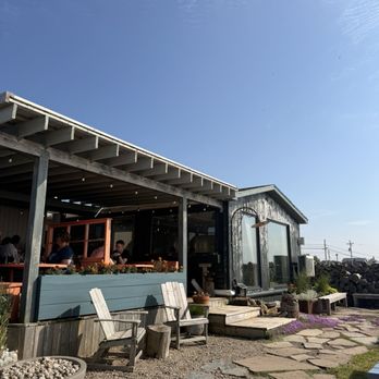 L'abri cafe, restaurant et bar - Outdoor seating area - Canadian (New) Near Me - Cheticamp, Nova Scotia L'abri cafe, restaurant et bar - Outdoor seating area - Canadian (New) Near Me - Cheticamp, Nova Scotia