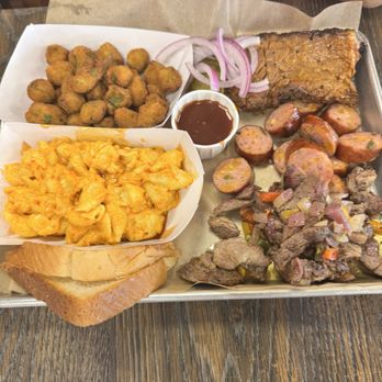 Smoke'N Ash BBQ - (3 meat platter) Berbere Mac & Cheese, Fried Okra, Awaze brisket, Awaze lamb, and sausage - Barbeque Near Me - Arlington, Texas