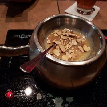 The Melting Pot - Cookie Butter Crunch...white chocolate, caramel, cookie butter, and sliced almonds. Sinfully delicious! - Fondue Near Me - Arlington, Virginia The Melting Pot - Cookie Butter Crunch...white chocolate, caramel, cookie butter, and sliced almonds. Sinfully delicious! - Fondue Near Me - Arlington, Virginia