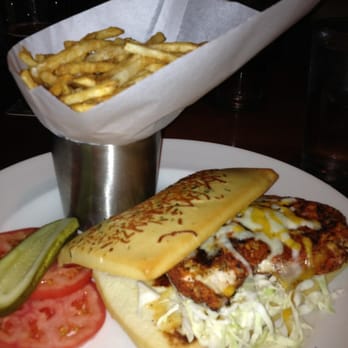 Yard House - Vegetarian spicy 'chicken' sandwich w truffle fries. Yummy! And left overs taste even better b the flavor soaks in more - Bars Near Me - Houston, Texas
