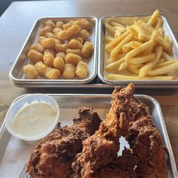 Nashville Hot chicken with fries and tots!! Nashville Hot chicken with fries and tots!!