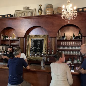 Bearded Iris Brewing - a group of people at the bar - Breweries Near Me - Nashville, Tennessee